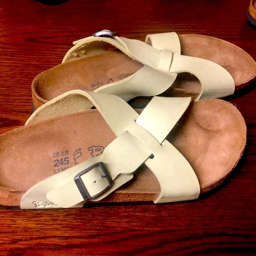 Gently worn mint green Birkenstock sandals
